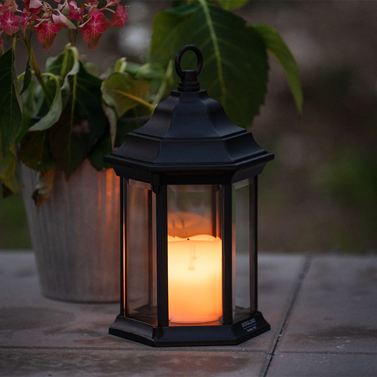 Battery operated lantern with twilight sensor