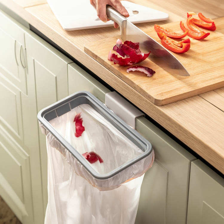 Food waste bag holder for cupboards