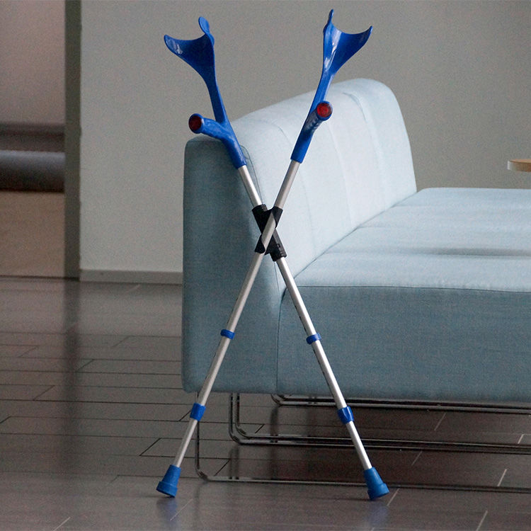 XCLIP crutch holder keeps the forearm crutches standing upright.