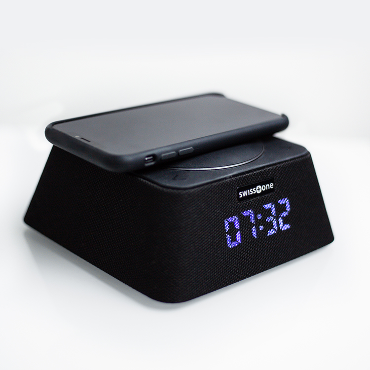 Alarm clock with radio & portable Qi-charger