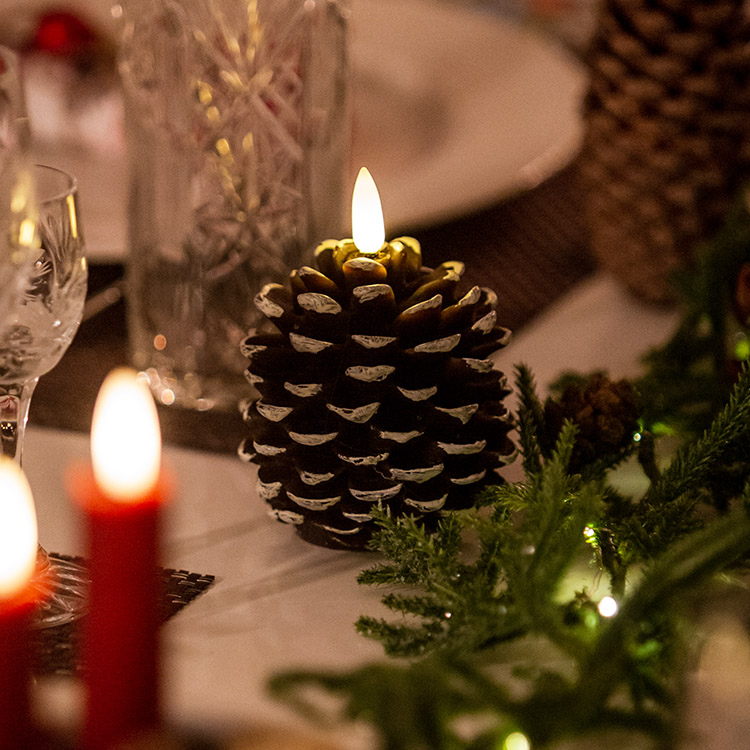 Decorative pine cone with LED flame