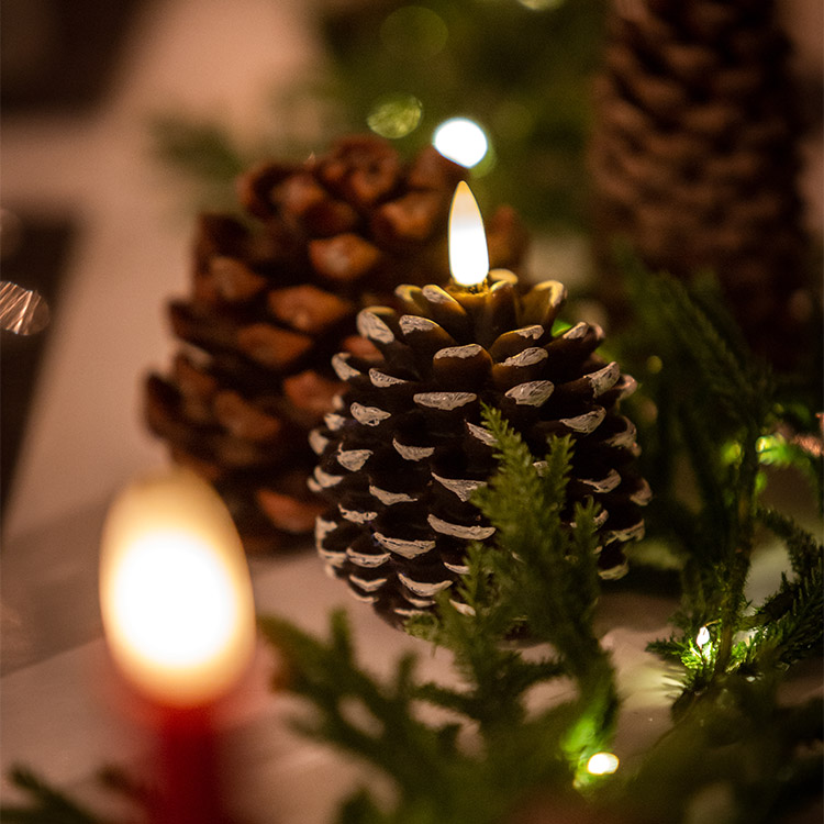 Decorative pine cone with LED flame