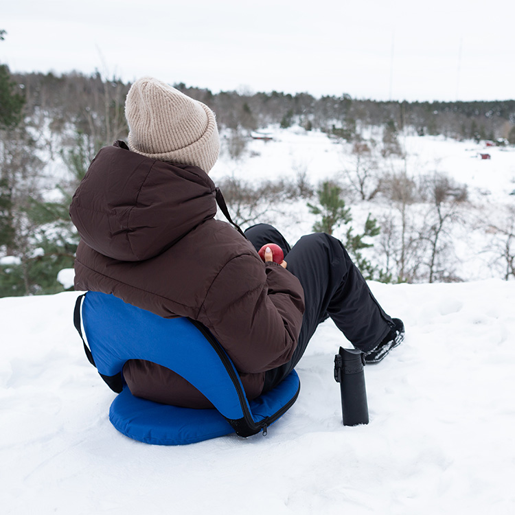 Folding chair with upholstered cushion