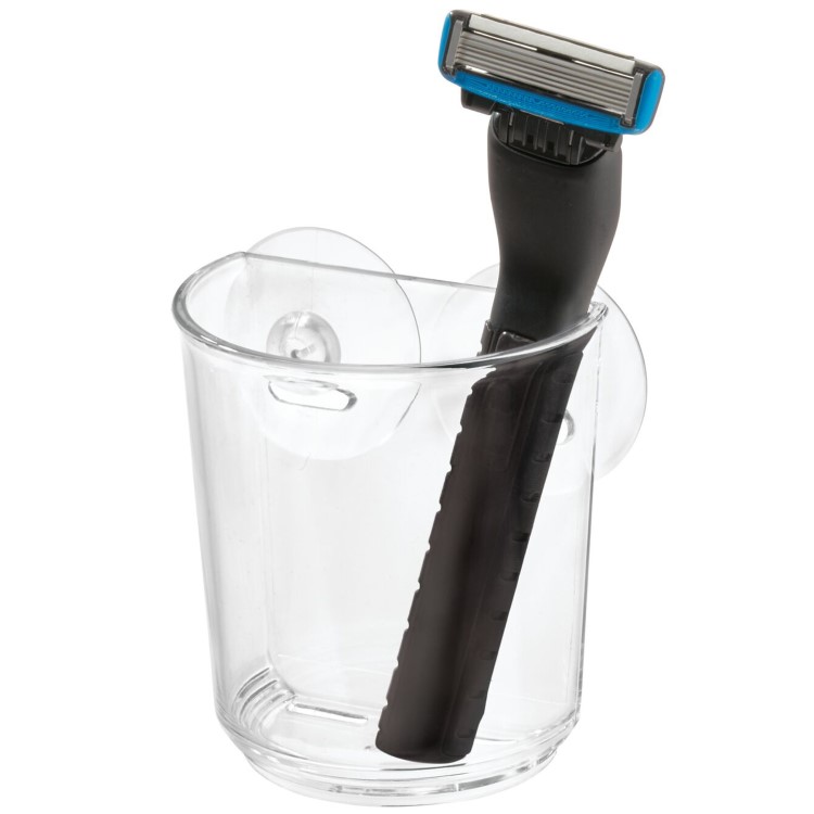 Bathroom cup with suction attachment