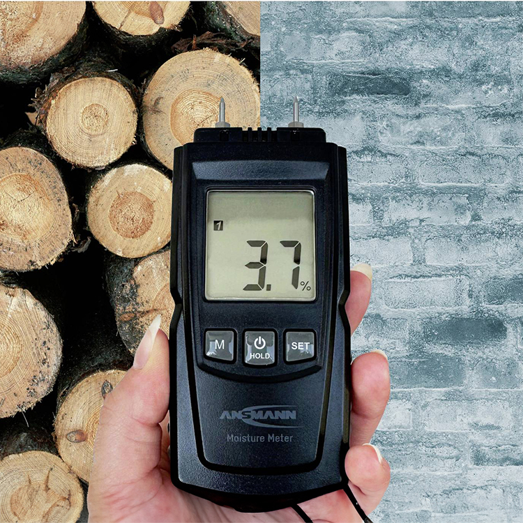 Moisture meter for solid materials