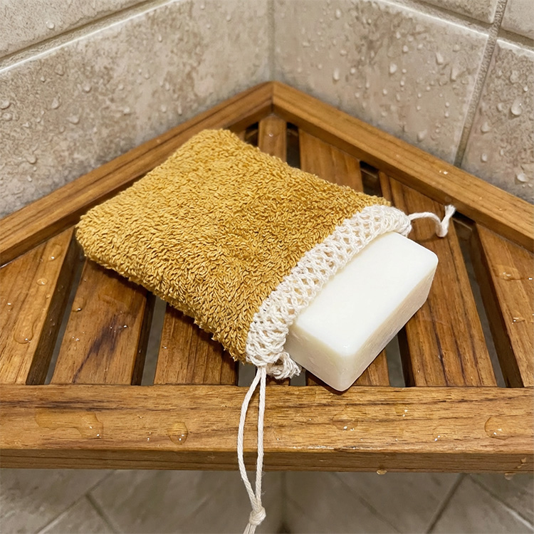 Soap pouch with exfoliating surface