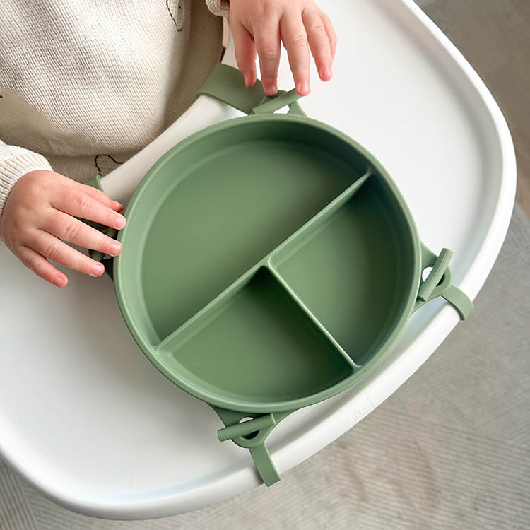 Children's plate with suction cup and strap