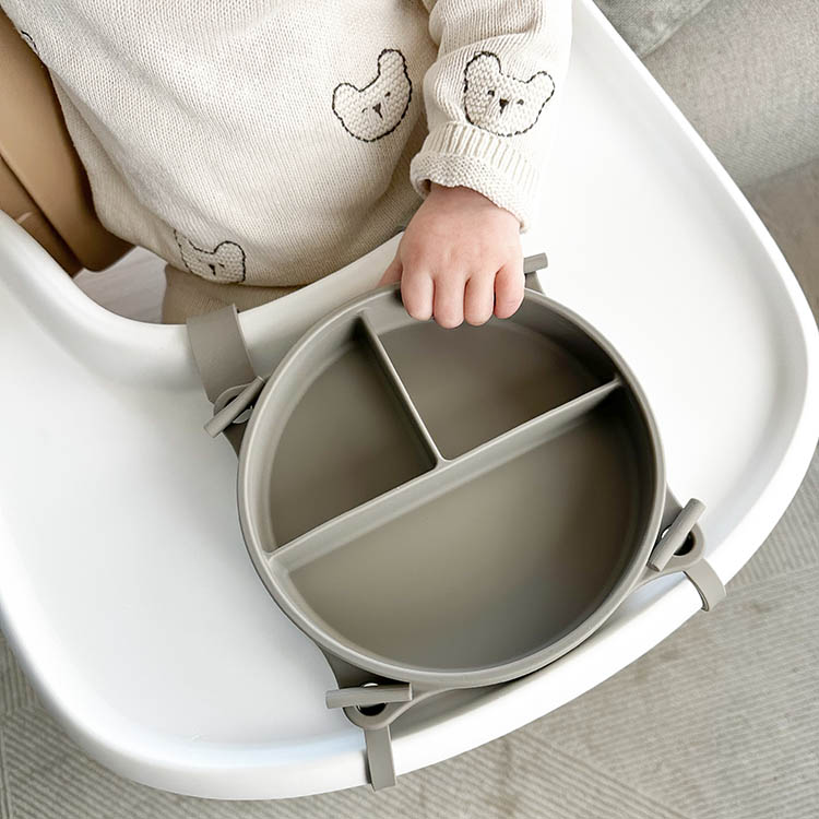 Children's plate with suction cup and strap