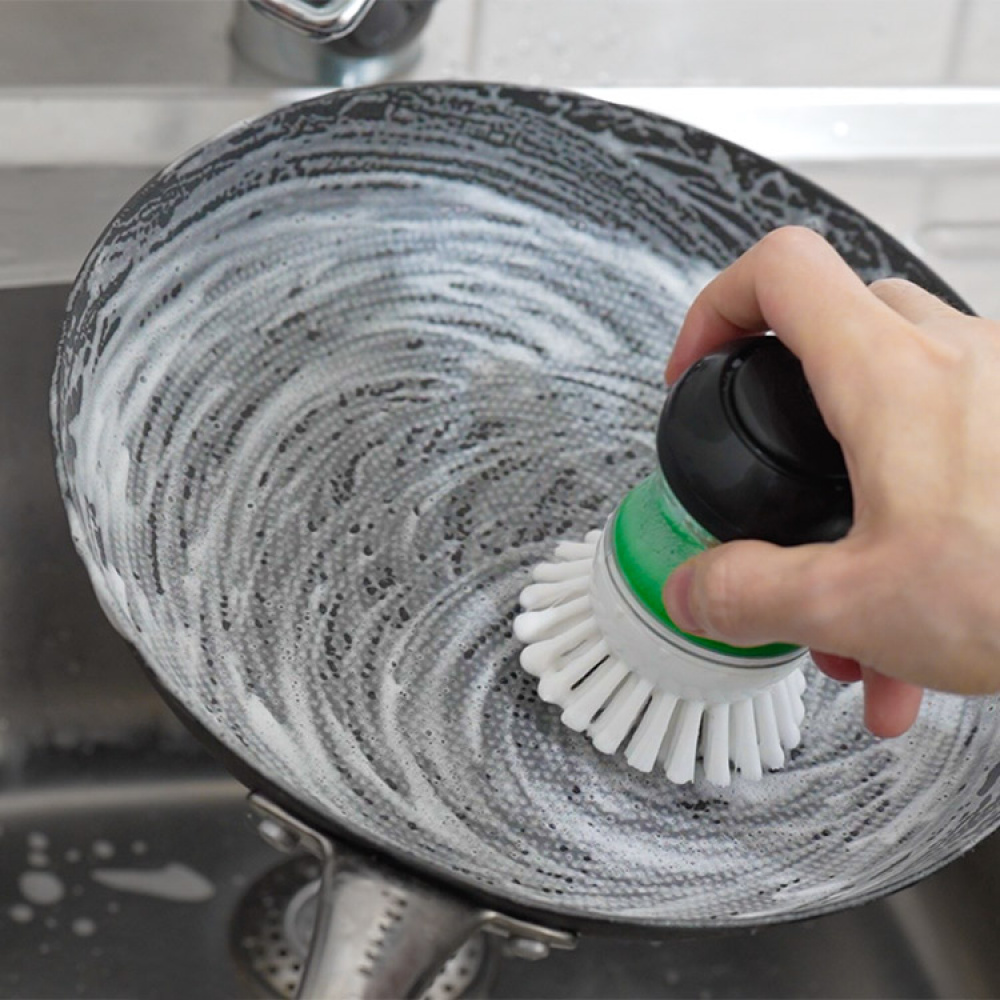 Handheld washing-up brush and washing-up liquid container