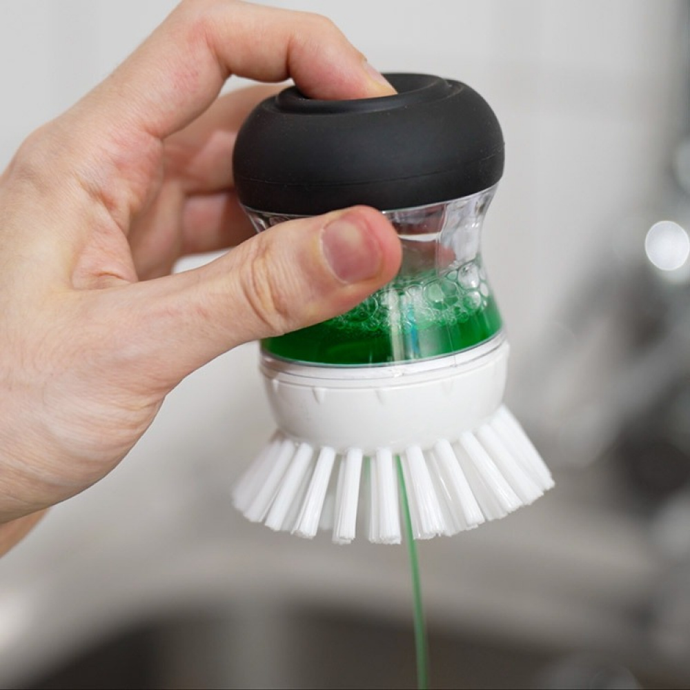 Handheld washing-up brush and washing-up liquid container