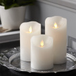 Candle with flickering flame