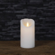 Candle with flickering flame