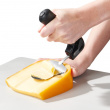 Ergonomic cheese slicer