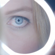 Magnifying mirror with lighting