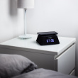 Alarm clock with radio & portable Qi-charger