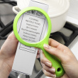 Magnetic magnifying glass