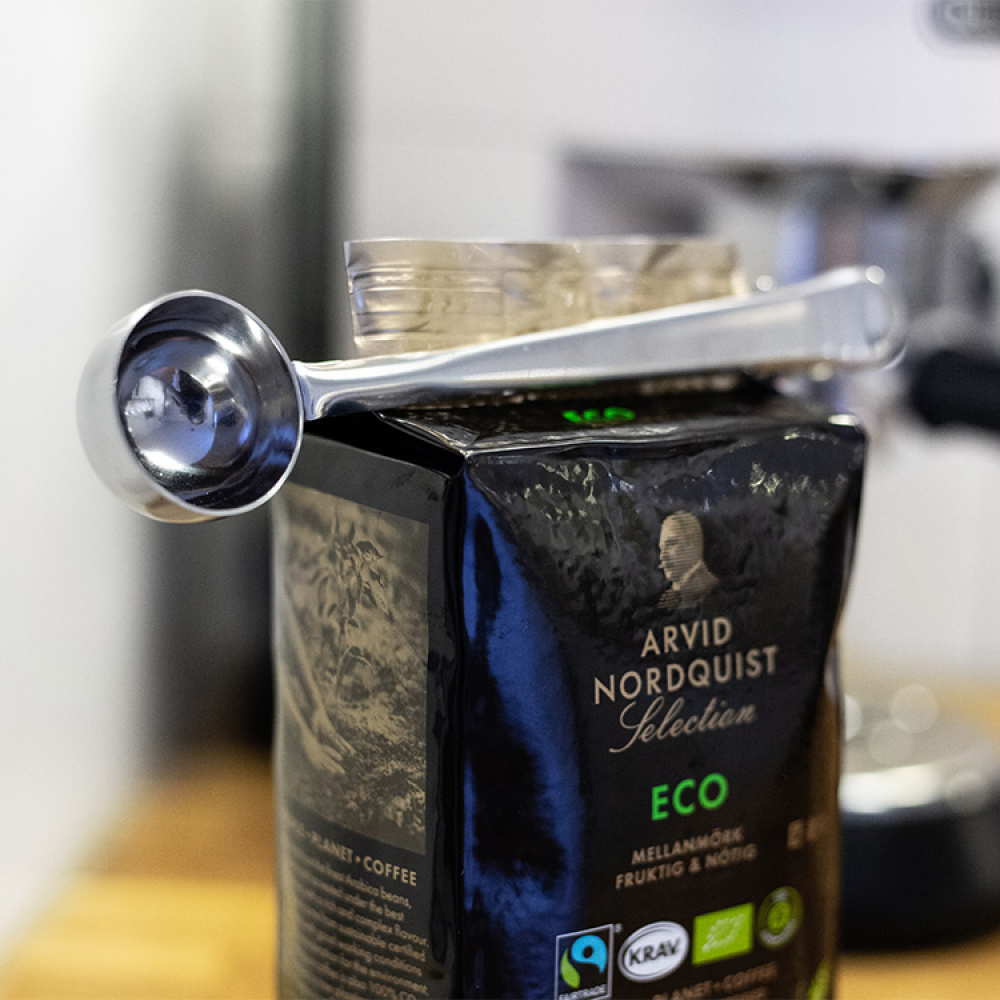 Coffee Scoop and Clip A metal coffee scoop and bag clip SmartaSaker