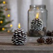 Decorative pine cone with LED flame
