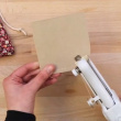 Handheld sewing machine