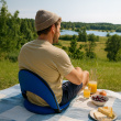Folding chair with upholstered cushion
