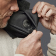Travel pillow with a hood