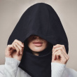 Travel pillow with a hood