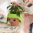 Self-watering plant pot, Face