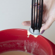 Gravy whisk with cleaner