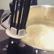 Gravy whisk with cleaner