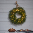 Battery-powered Christmas wreath with lighting