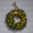 Battery-powered Christmas wreath with lighting