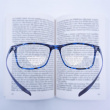 Reading lenses for glasses, Sticktite