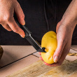 Self-sharpening potato peeler