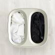 Laundry basket with sorting compartment