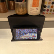 Mobile phone holder for kitchen cabinets