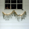 Garland with hanging evergreen branches