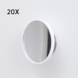 Magnifying travel mirror