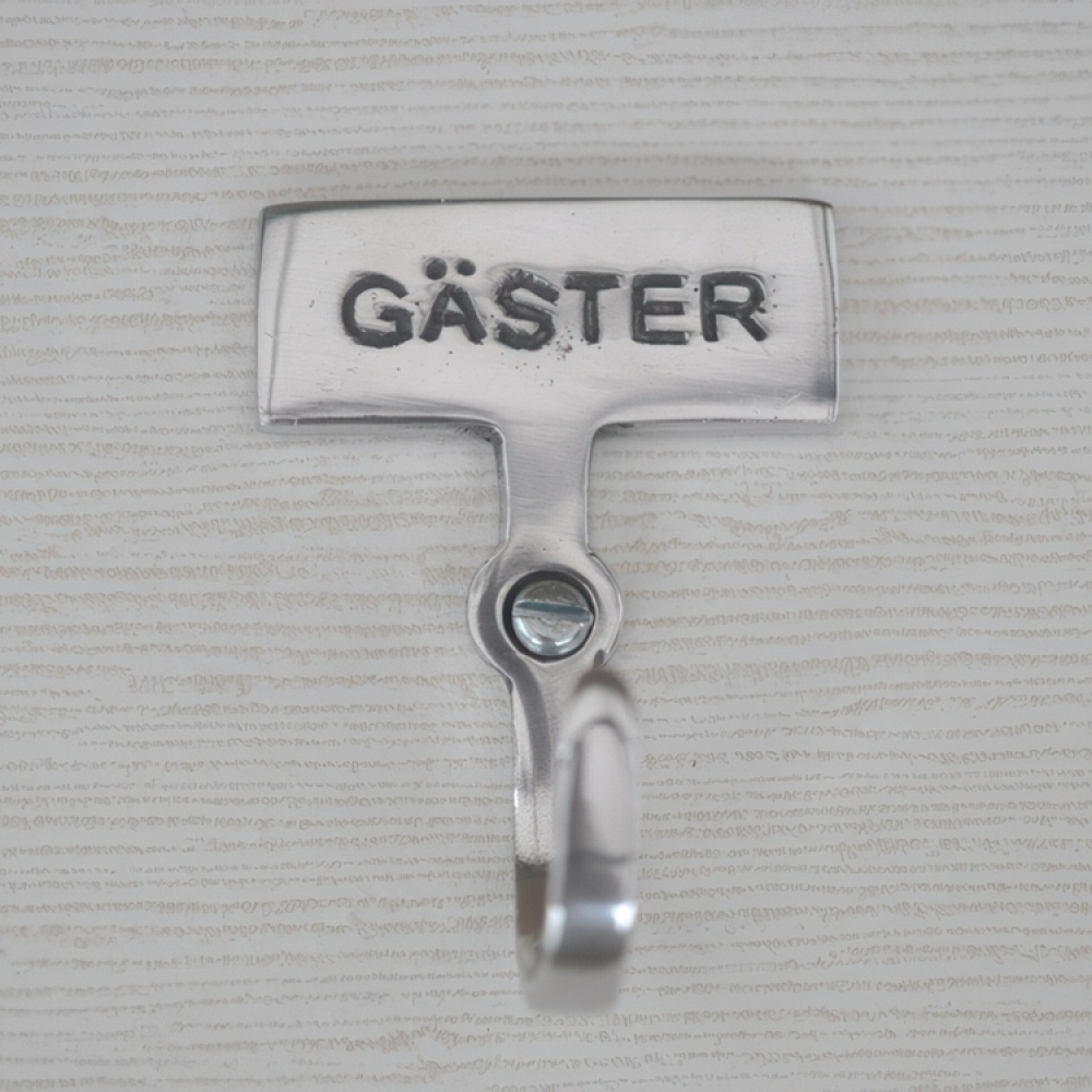 Hook with sign, GÄSTER, Exmez, Sand-cast aluminum in the group Storage / Bathroom storage at SmartaSaker.se (41523)