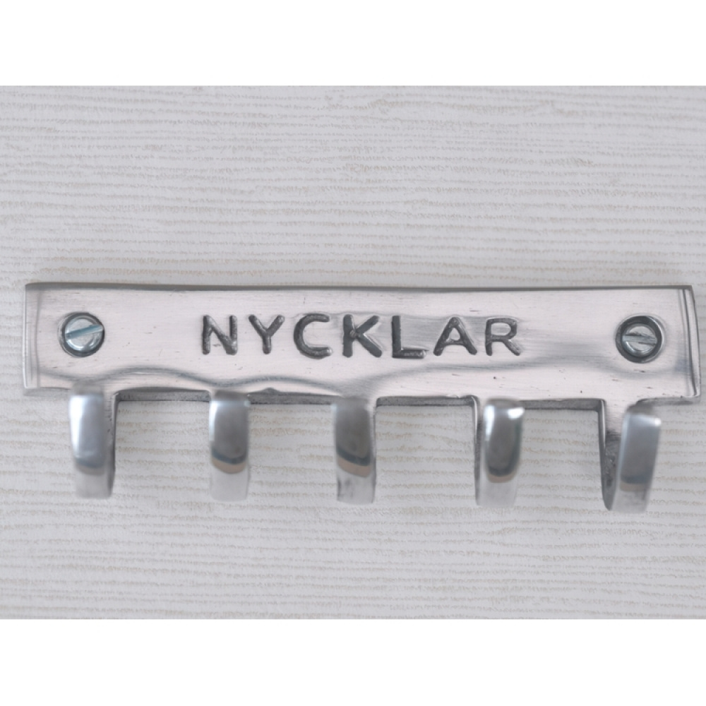 Hook strip, NYCKLAR, 12 x 3 x H 4 cm, Exmez, Sand-cast aluminum in the group Storage / Hallway storage / Key cabinets at SmartaSaker.se (41590)